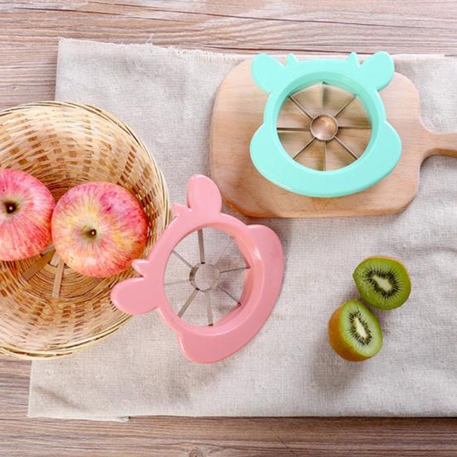 Apple cutting and coring tool with stainless steel blades for quick fruit slicing. Apple cutting and coring tool with stainless steel blades for quick fruit slicing.